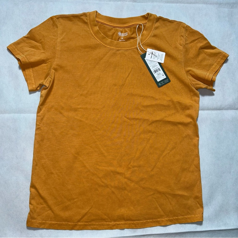 Alpine Design gold orange color baby tee NWT size XS